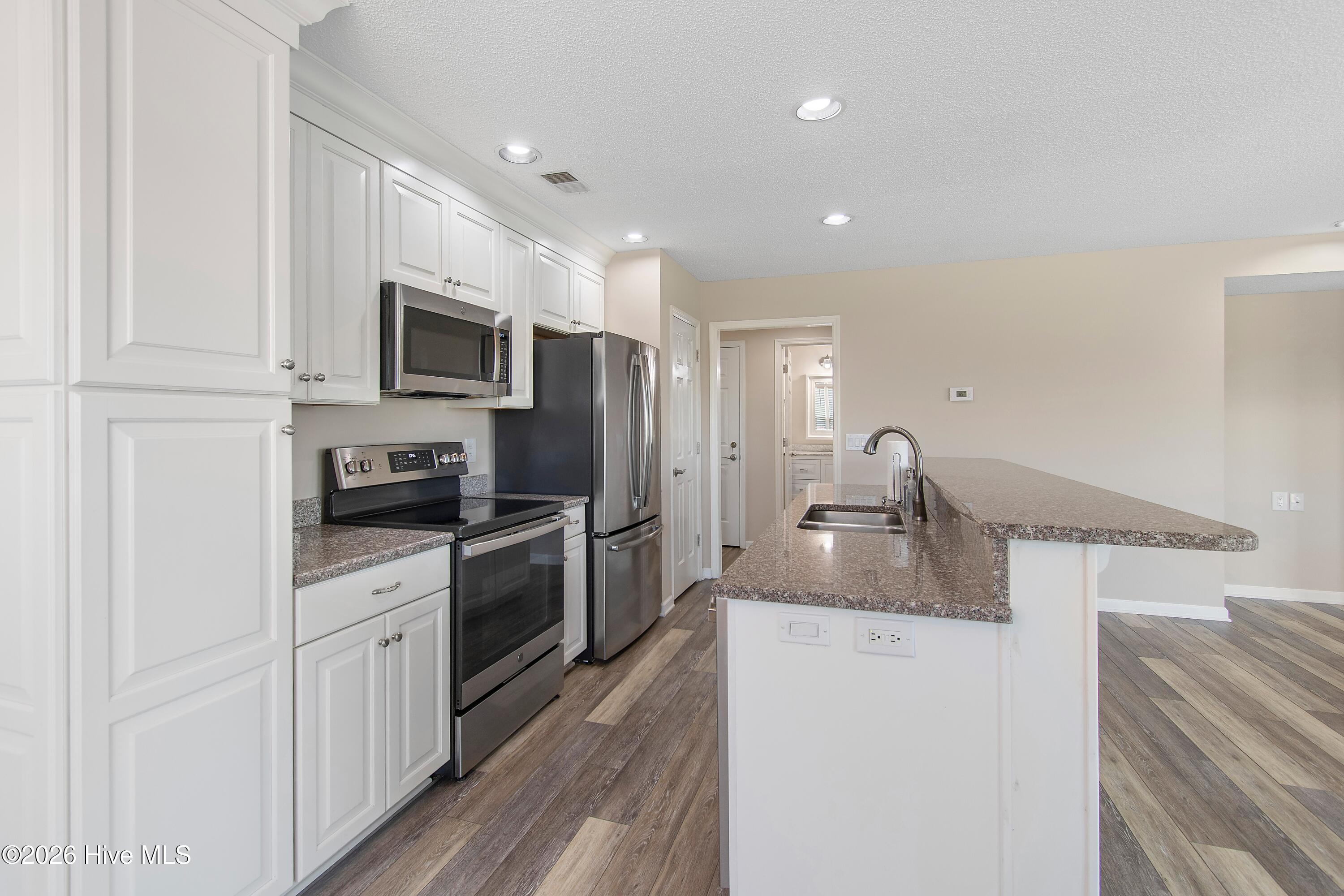 215 Clubhouse Road, Unit 2 Sunset Beach, NC 28468 - Photo 11 of 50 Kitchen