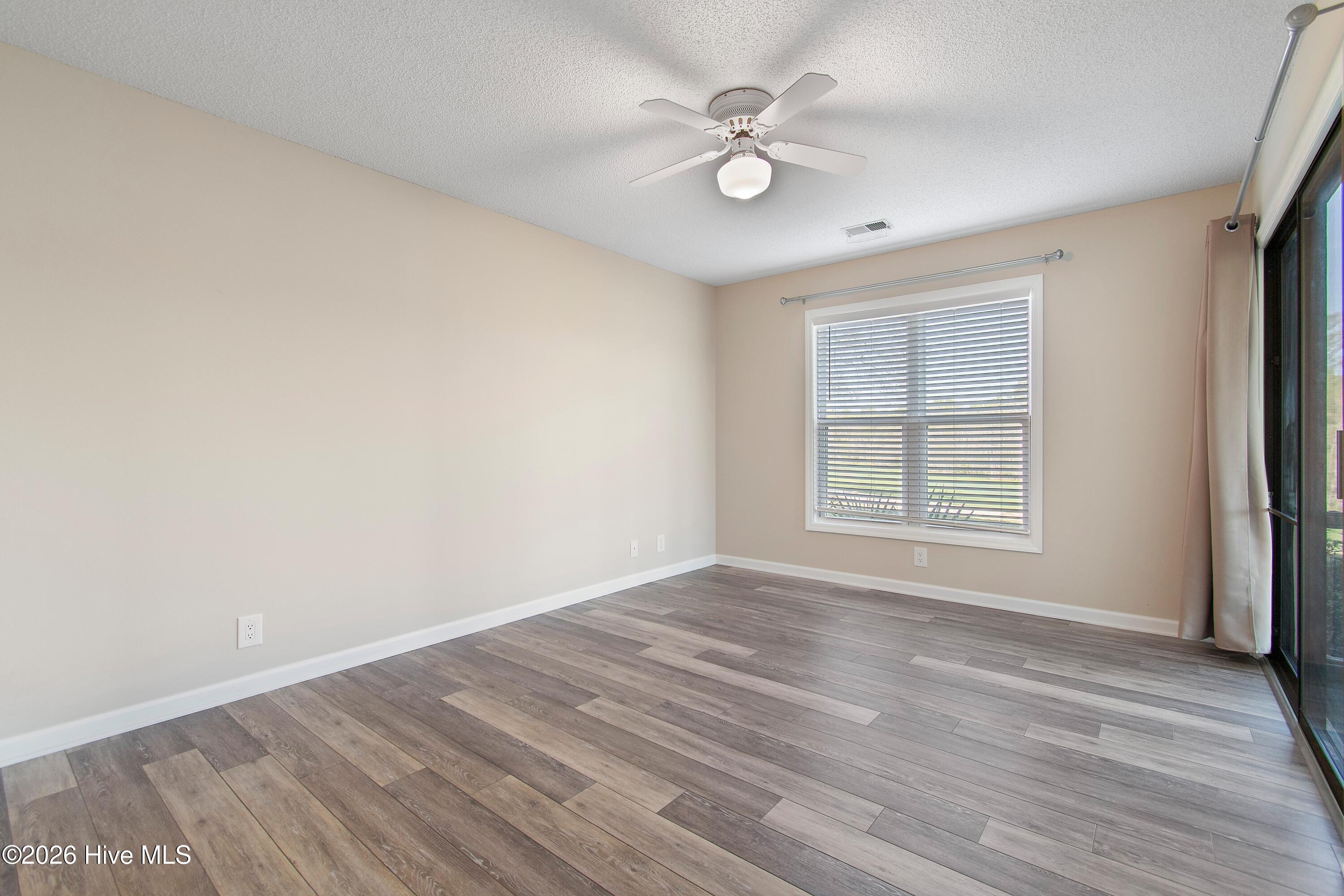 215 Clubhouse Road, Unit 2 Sunset Beach, NC 28468 - Photo 15 of 50 Primary bedroom