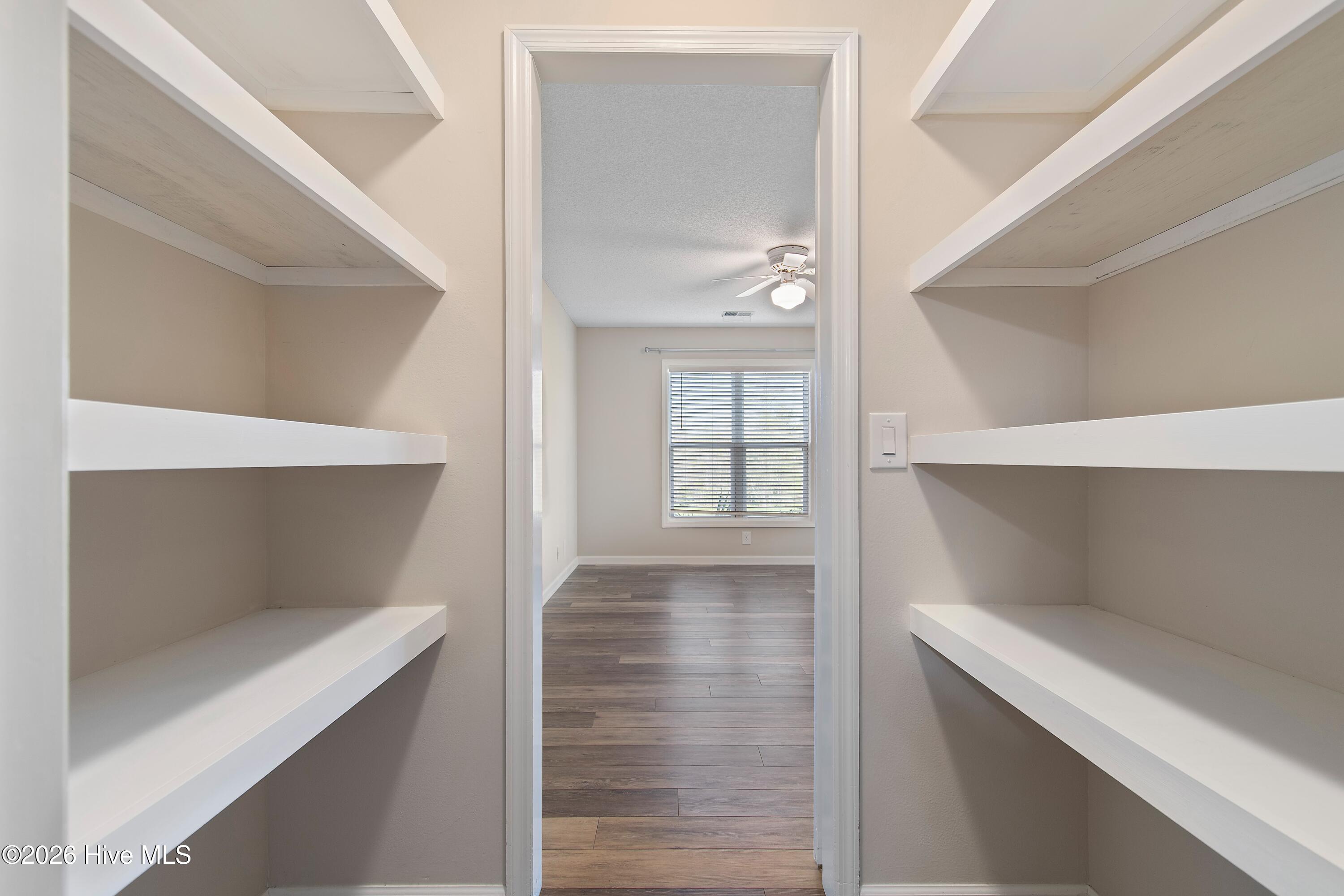 215 Clubhouse Road, Unit 2 Sunset Beach, NC 28468 - Photo 17 of 50 Primary BR closet