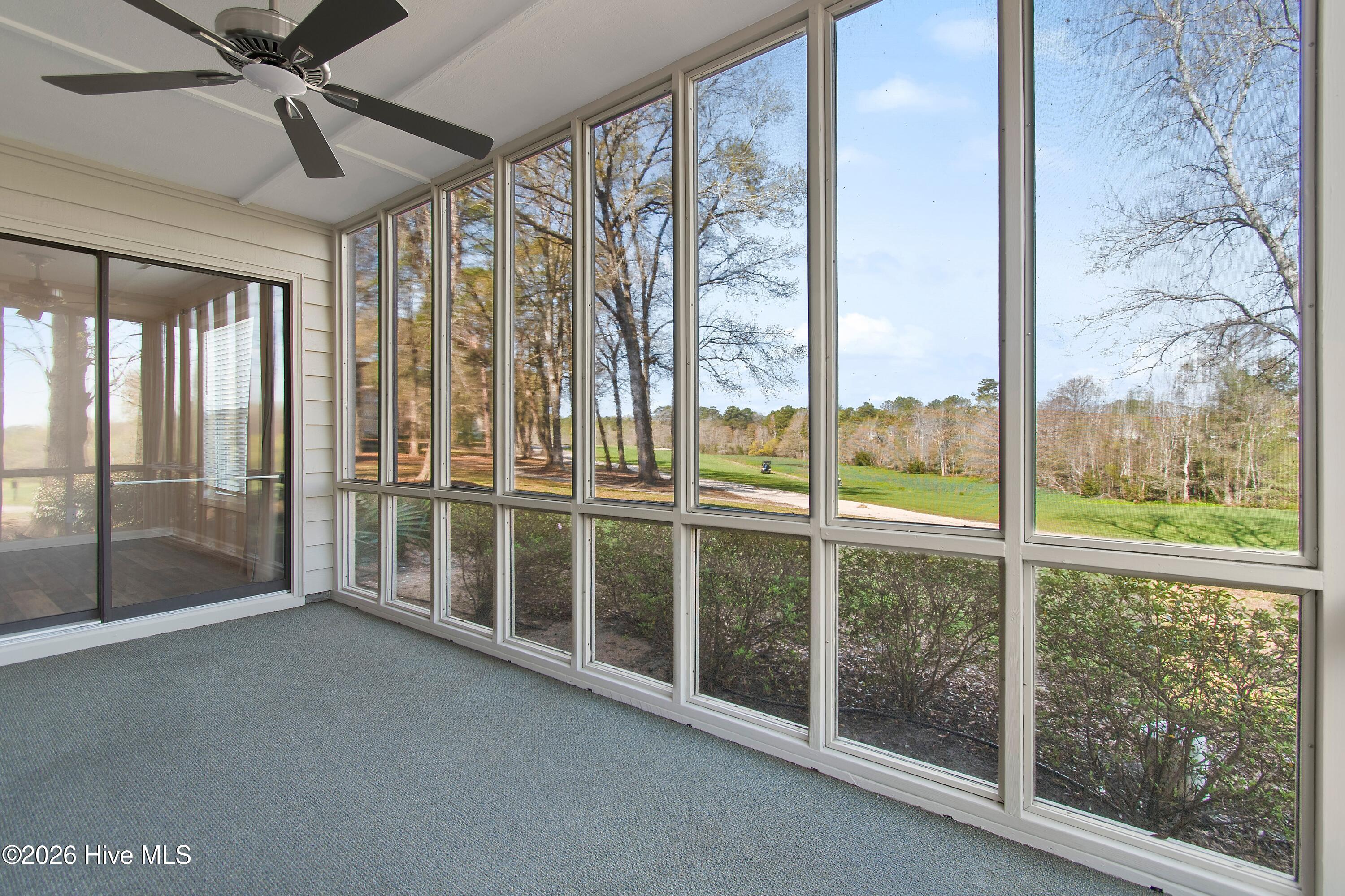 215 Clubhouse Road, Unit 2 Sunset Beach, NC 28468 - Photo 20 of 50 Main screened porch