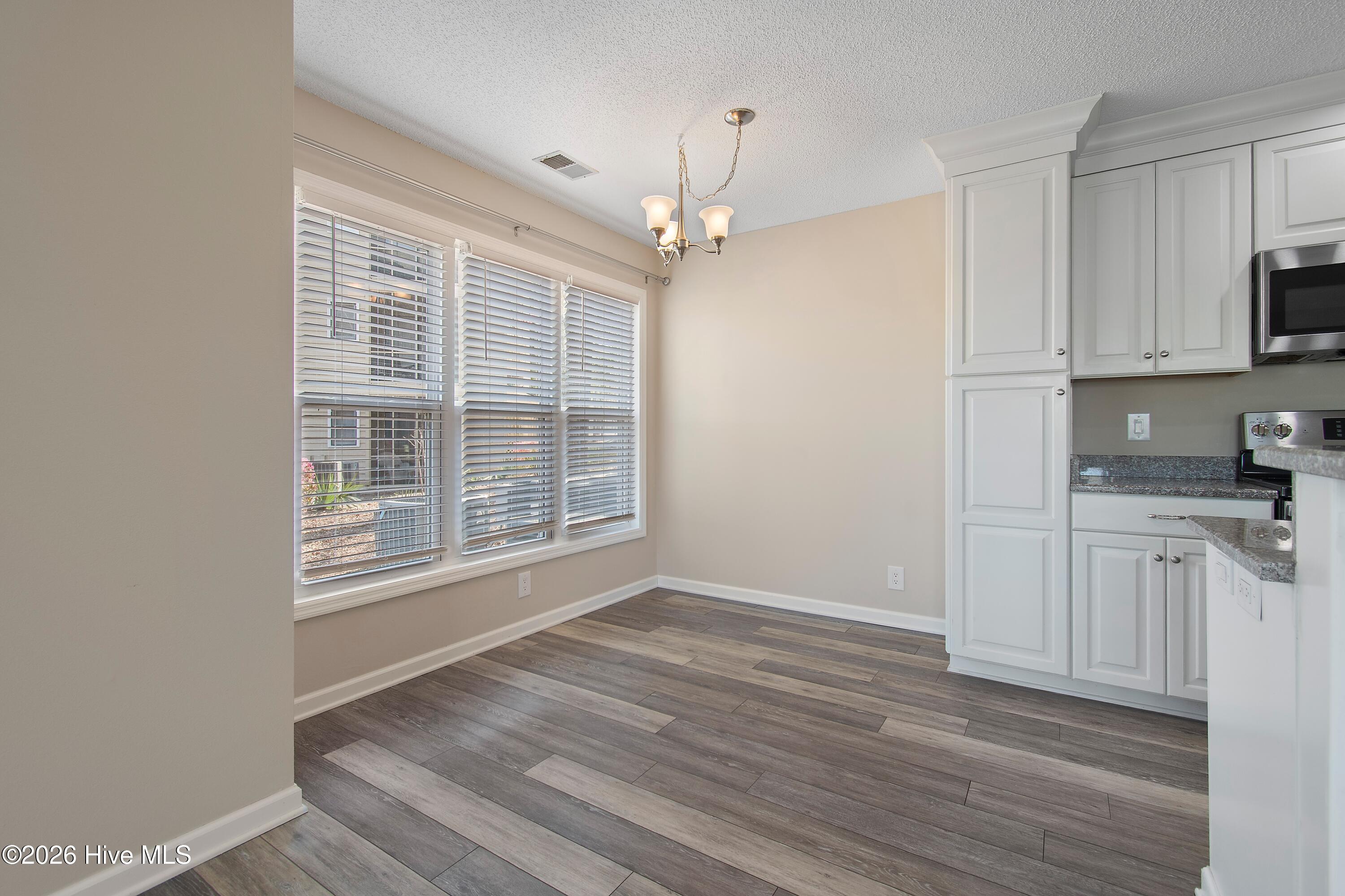 215 Clubhouse Road, Unit 2 Sunset Beach, NC 28468 - Photo 9 of 50 Dining area