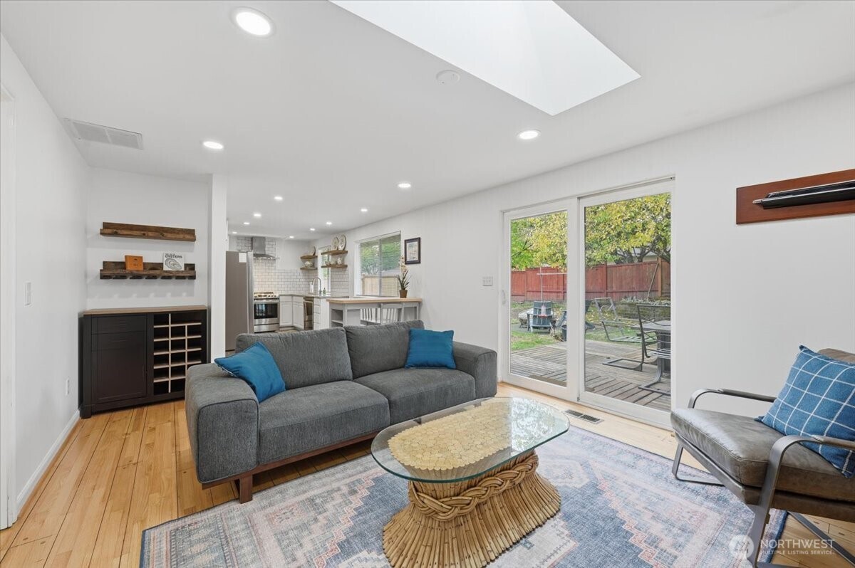 611 216th Street Southwest Bothell, WA 98021 - Photo 11 of 22 a living room with furniture and a large window