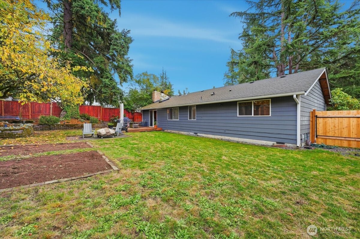 611 216th Street Southwest Bothell, WA 98021 - Photo 21 of 22 a view of a house with backyard and sitting area