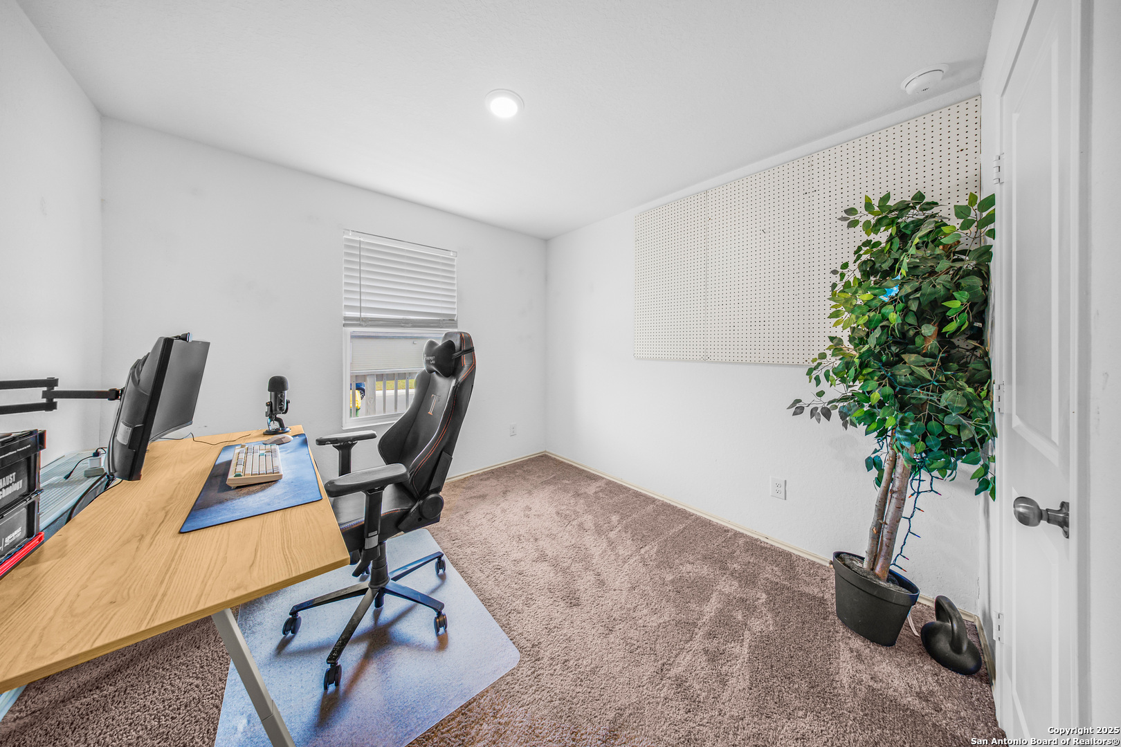 5424 Thyme Corner St. Hedwig, TX 78152 - Photo 11 of 21 a view of a room with gym equipment