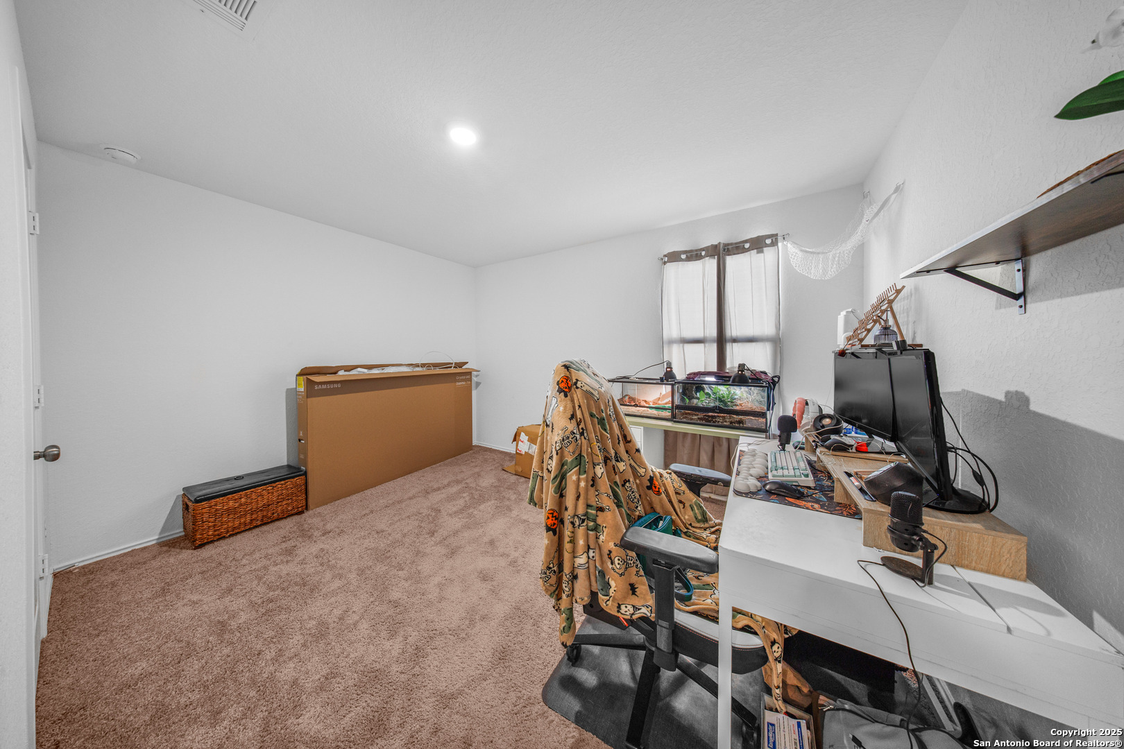 5424 Thyme Corner St. Hedwig, TX 78152 - Photo 13 of 21 a view of a workspace with furniture and a window
