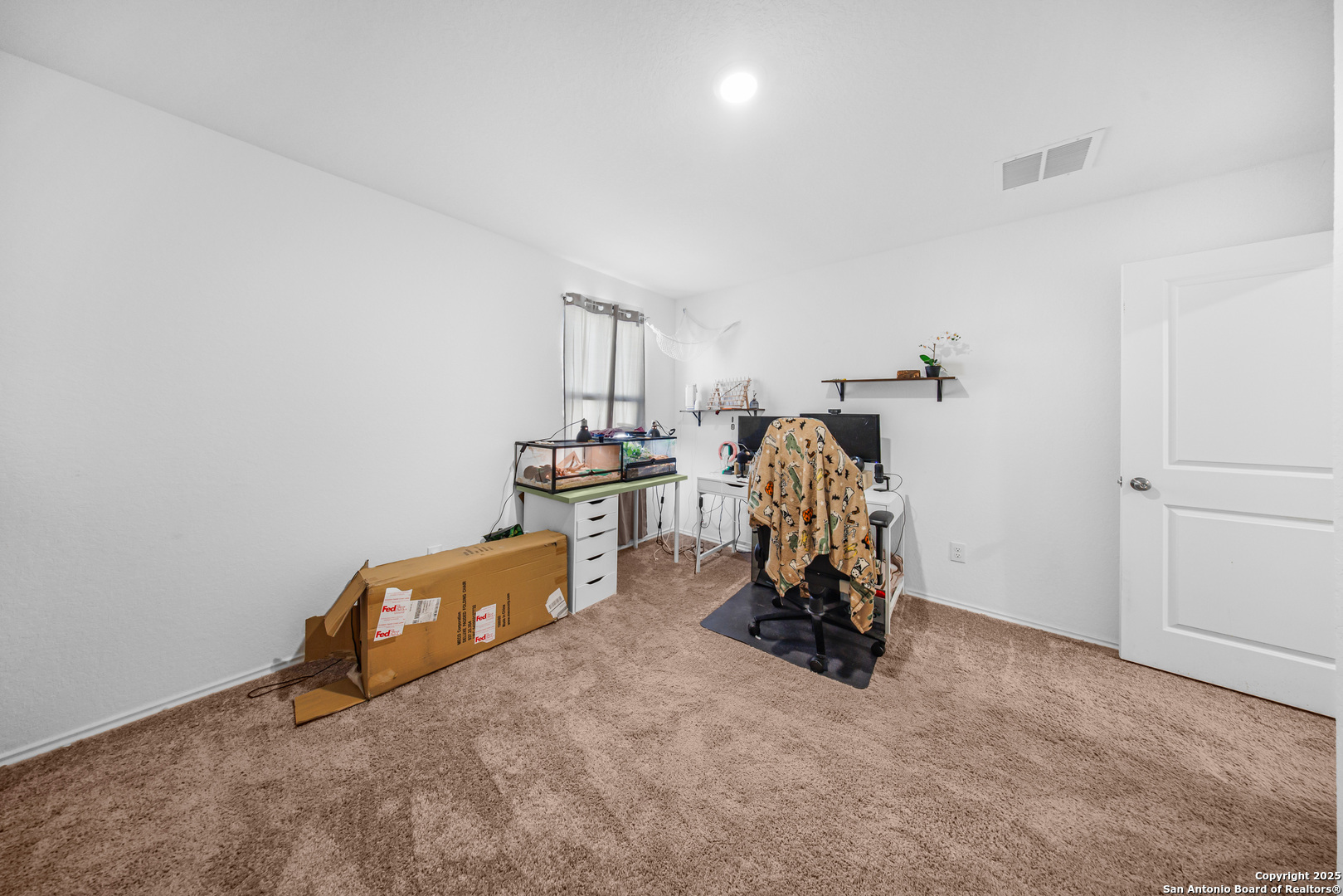 5424 Thyme Corner St. Hedwig, TX 78152 - Photo 14 of 21 a view of game room with window