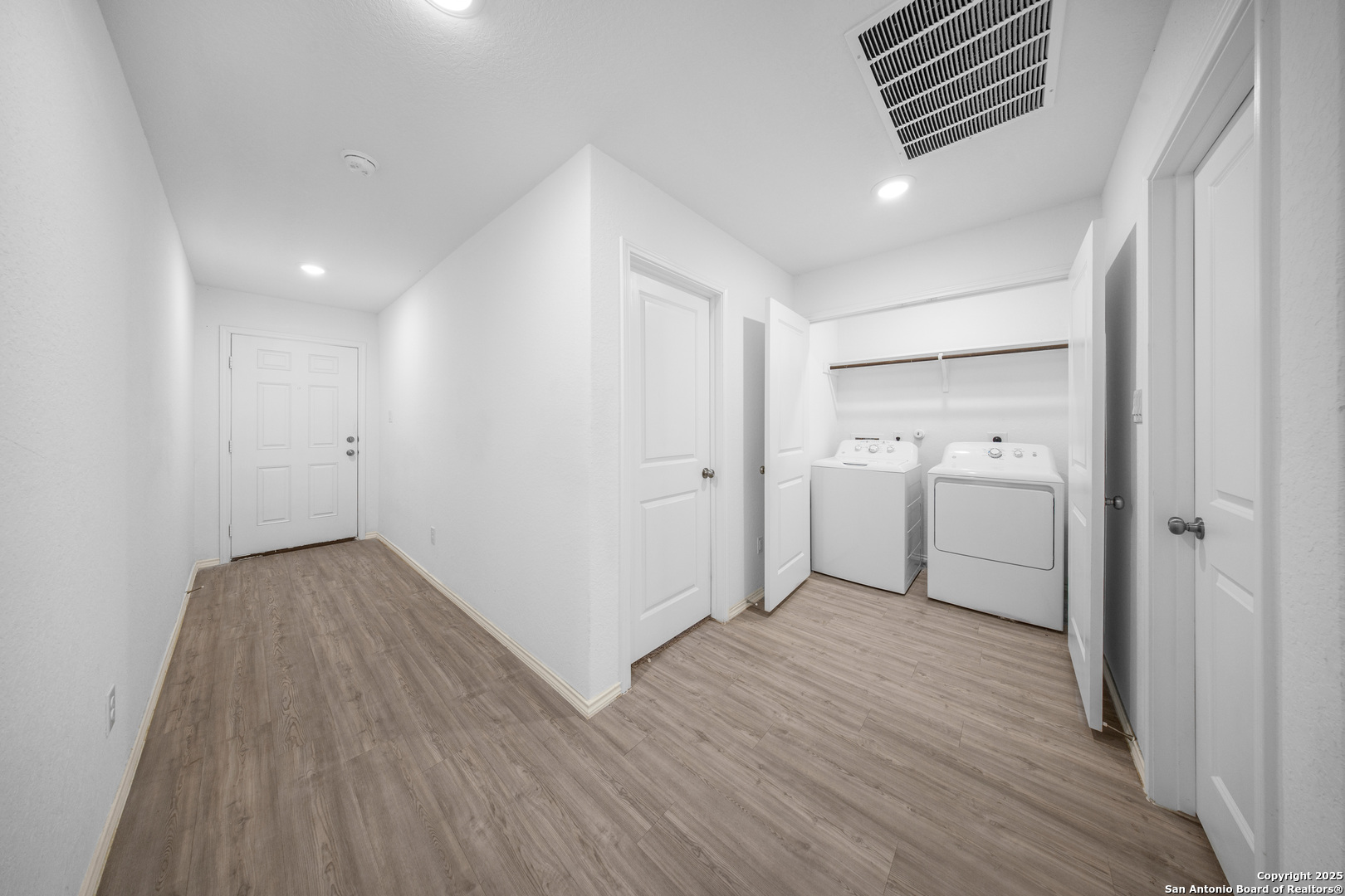 5424 Thyme Corner St. Hedwig, TX 78152 - Photo 2 of 21 a view of hallway with wooden floor