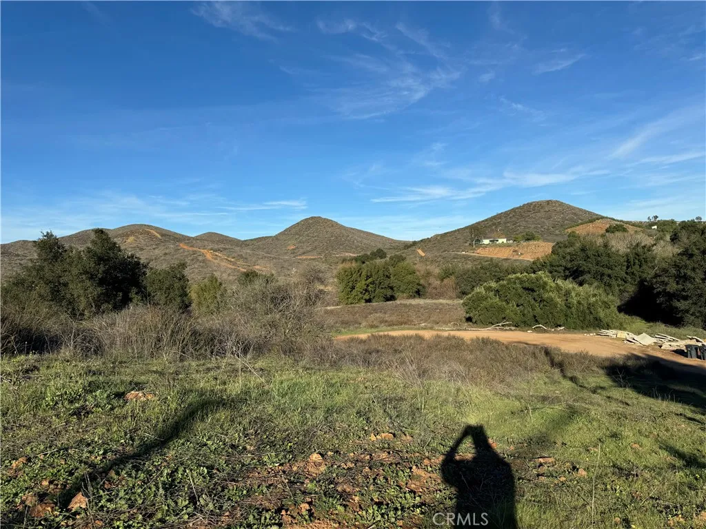 15 Orange Street Menifee, CA 92584 - Photo 2 of 7 a view of an outdoor space and a yard