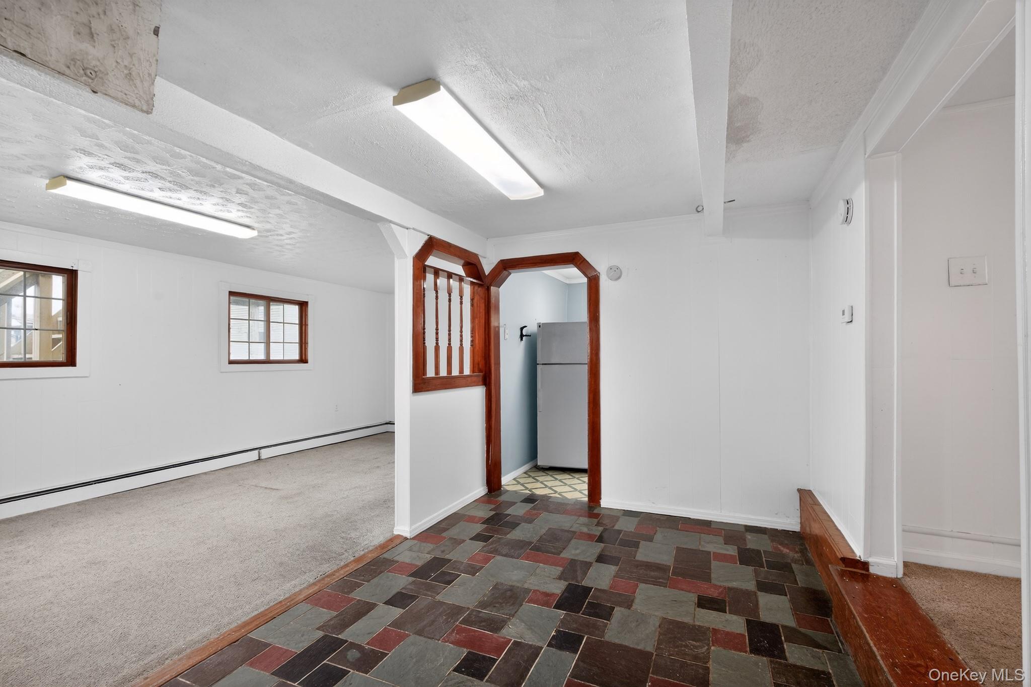 138 Spring Street Massapequa, NY 11758 - Photo 37 of 45 a view of a hallway with front door