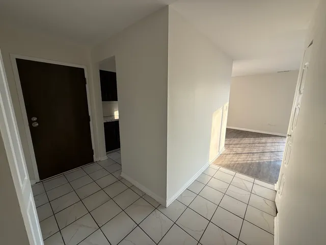 a kitchen with a stove microwave and refrigerator