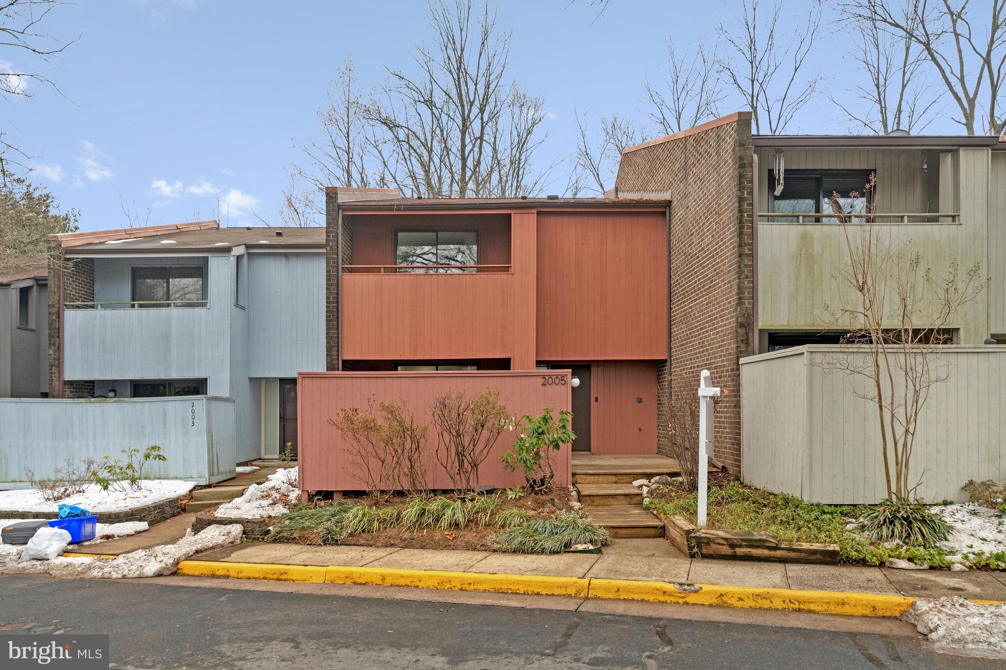 2005 Wethersfield Court Reston, VA 20191 - Photo 1 of 43 a view of a house with tub and car parked