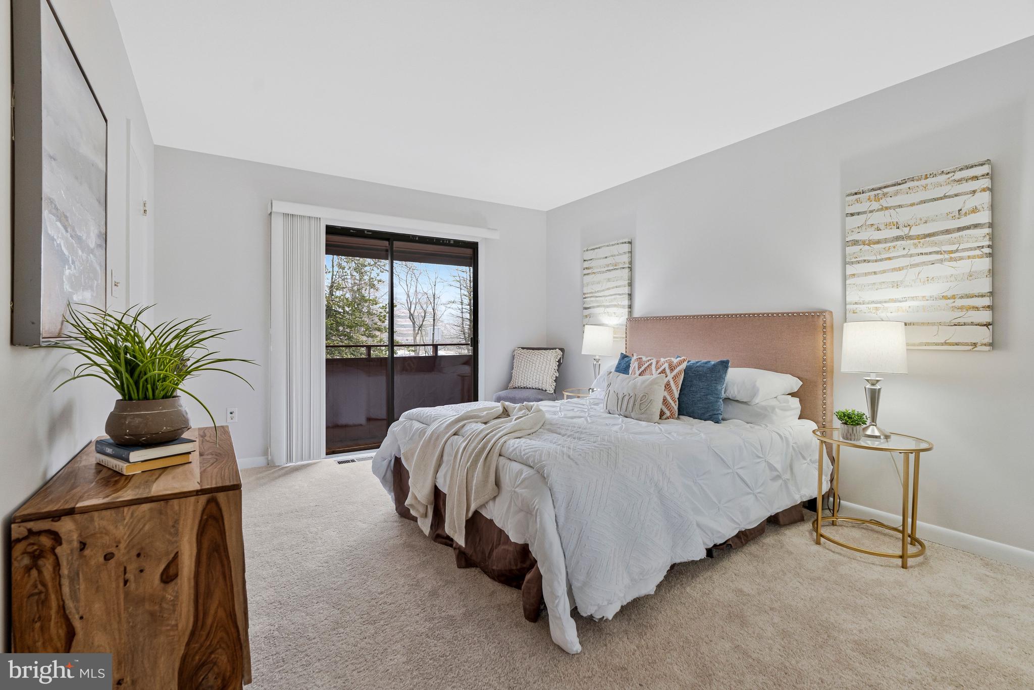 2005 Wethersfield Court Reston, VA 20191 - Photo 20 of 43 a bedroom with a bed and window