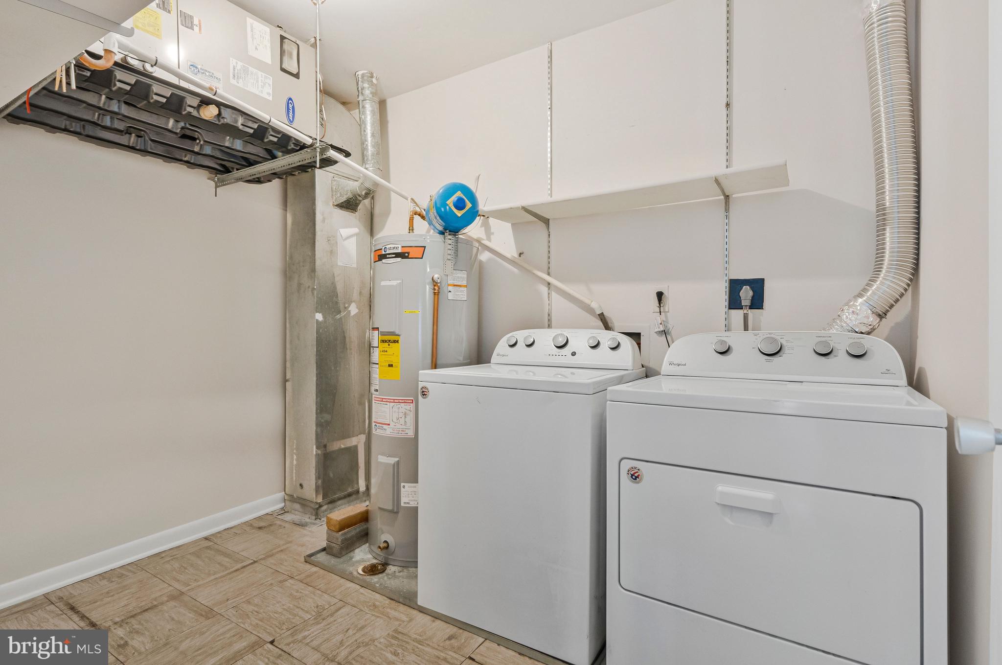 2005 Wethersfield Court Reston, VA 20191 - Photo 35 of 43 a utility room with dryer and washer