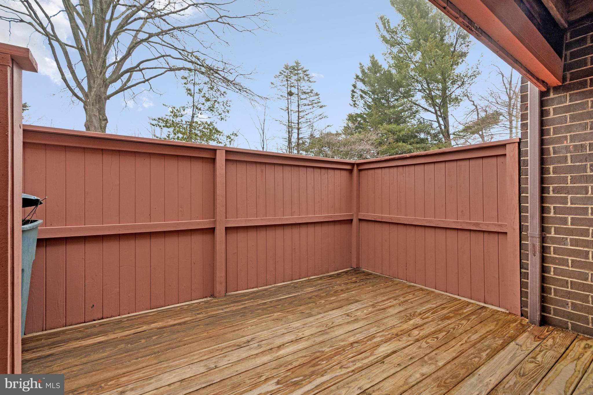 2005 Wethersfield Court Reston, VA 20191 - Photo 37 of 43 a view of a backyard with wooden fence