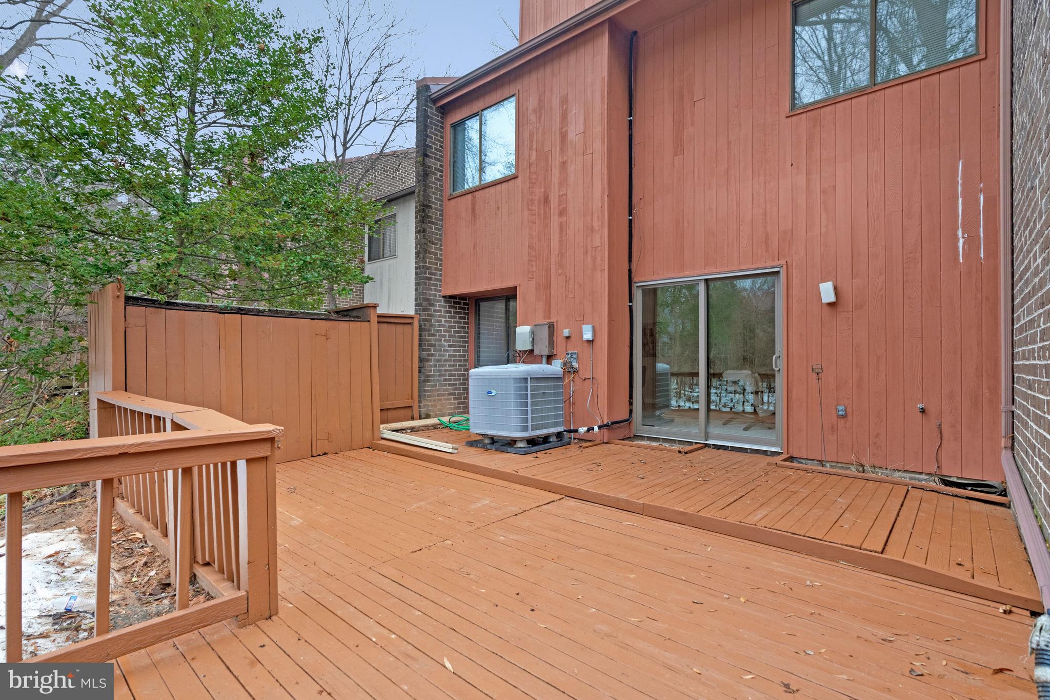 2005 Wethersfield Court Reston, VA 20191 - Photo 41 of 43 a view of backyard with barbeque grill and wooden fence