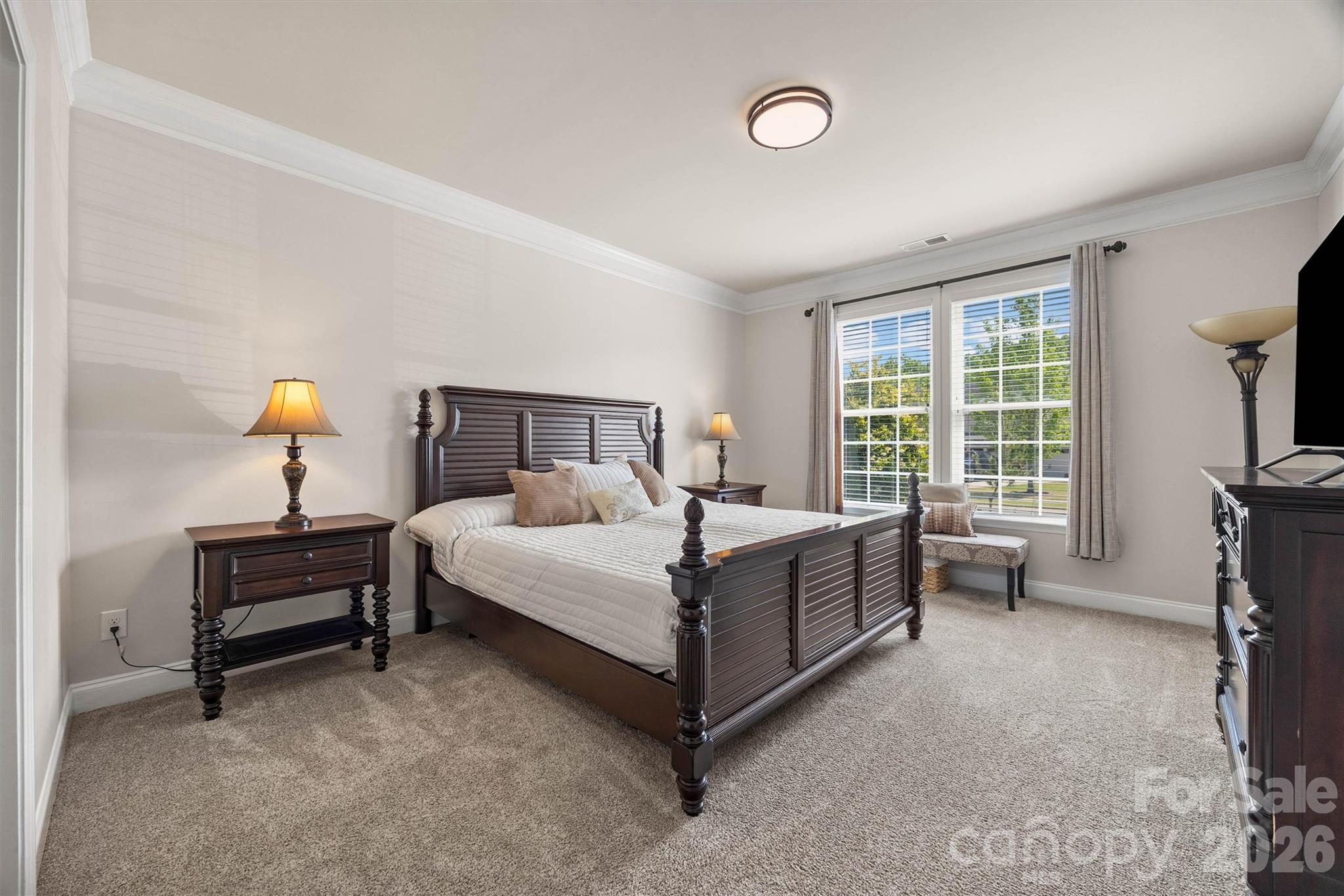 299 Annatto Way Tega Cay, SC 29708 - Photo 21 of 46 a bed room with a bed and a chair