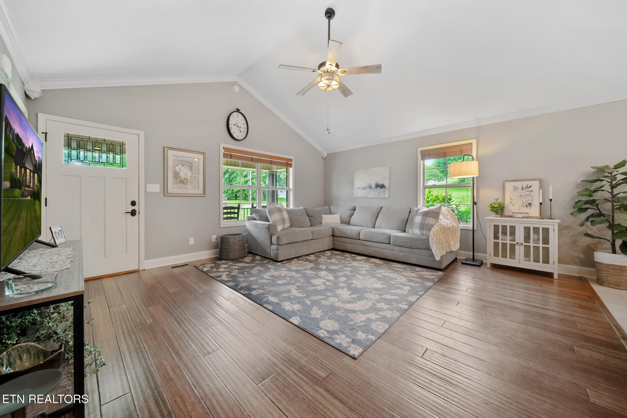 8012 Campbells Point Road Corryton, TN 37721 - Photo 11 of 39 a living room with furniture and a flat screen tv