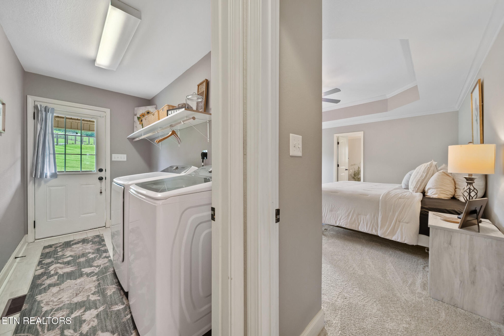 8012 Campbells Point Road Corryton, TN 37721 - Photo 16 of 39 a spacious bedroom with a bed and a window