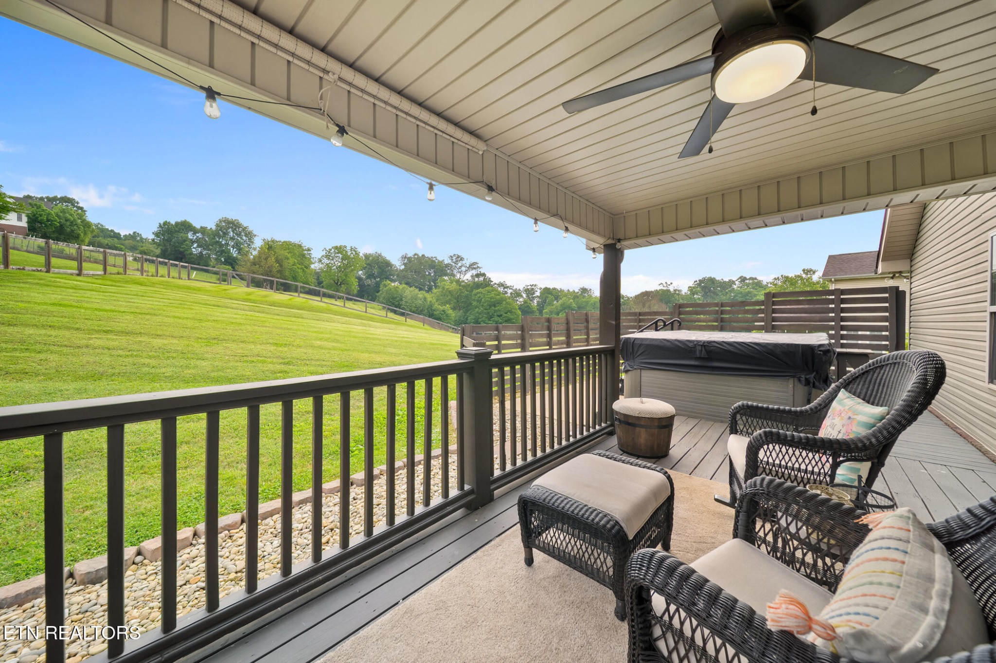 8012 Campbells Point Road Corryton, TN 37721 - Photo 24 of 39 a view of a chair and tables in the balcony