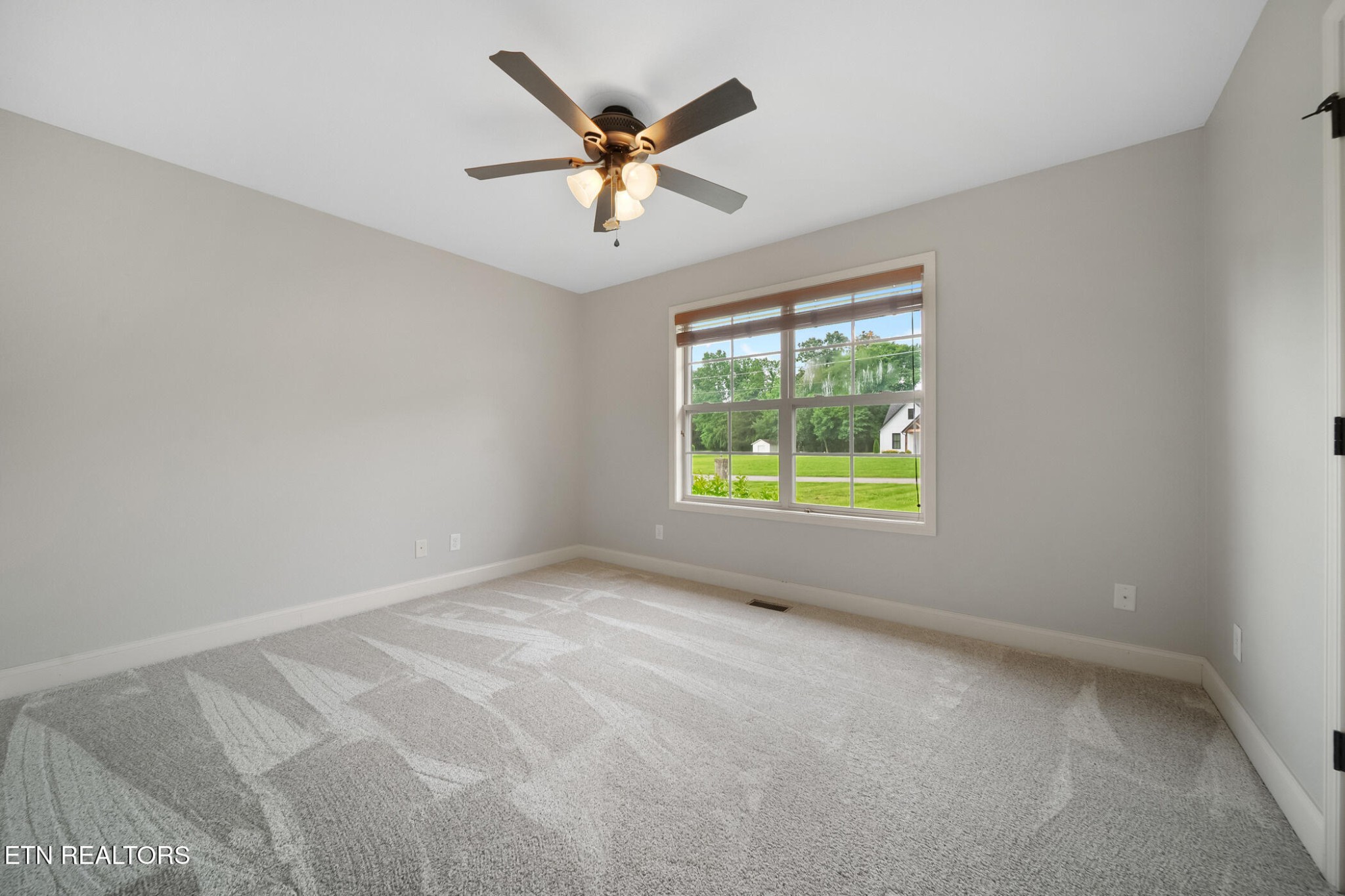 8012 Campbells Point Road Corryton, TN 37721 - Photo 29 of 39 an empty room with a window