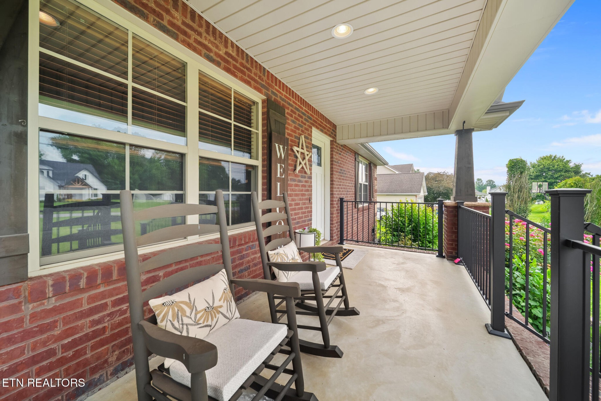 8012 Campbells Point Road Corryton, TN 37721 - Photo 7 of 39 a building outdoor space with patio furniture and potted plants