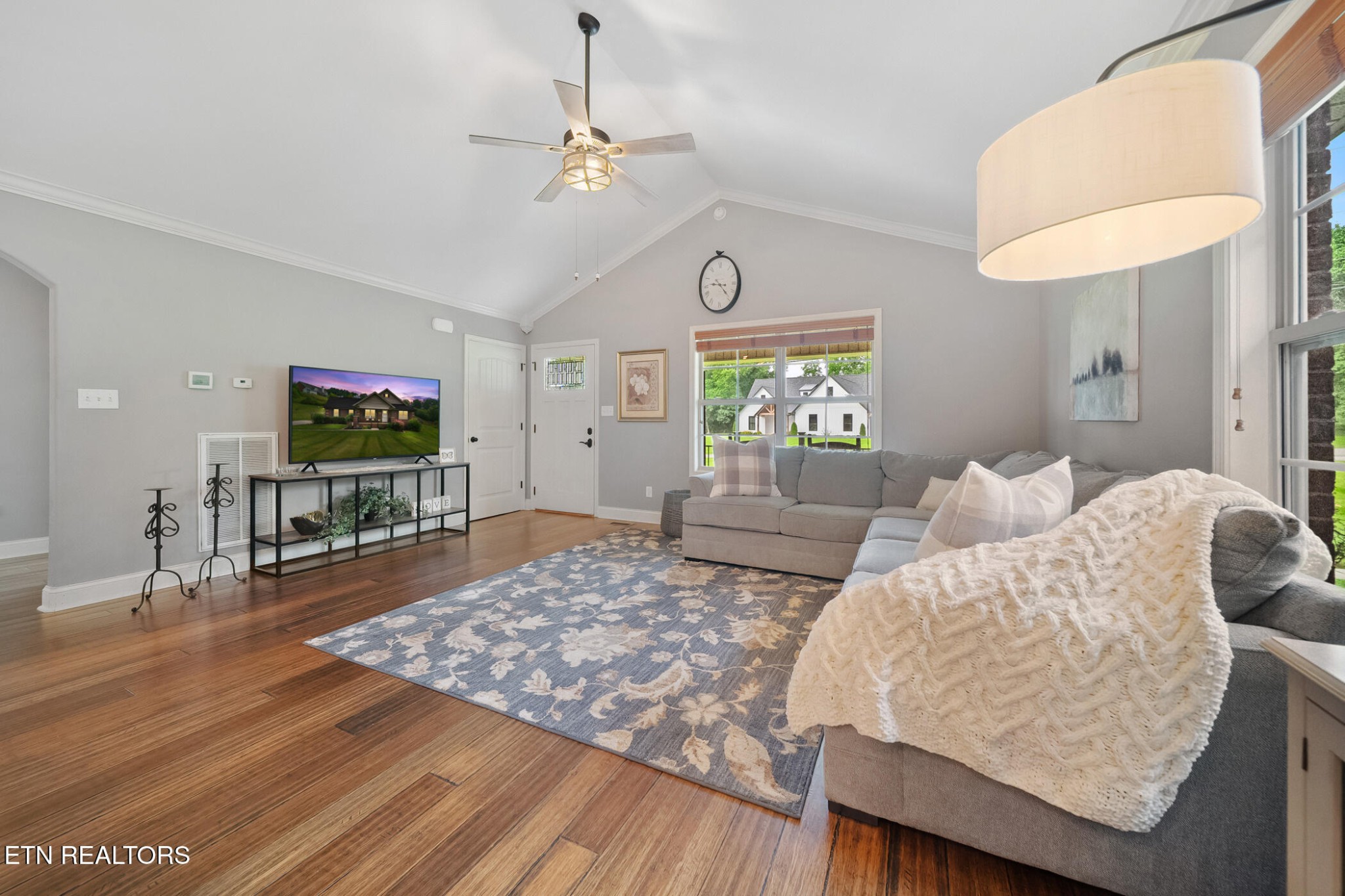8012 Campbells Point Road Corryton, TN 37721 - Photo 10 of 39 a living room with furniture and a flat screen tv