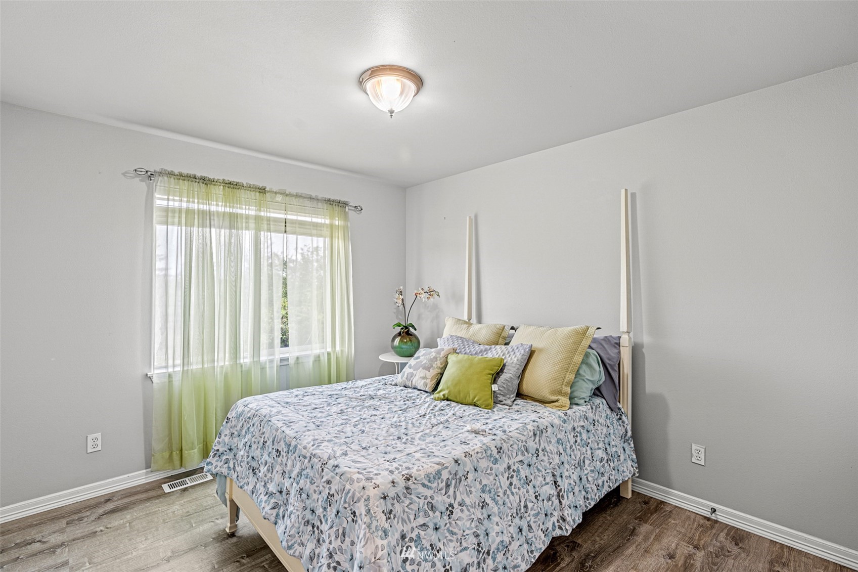 659 Orcas Avenue Northeast Renton, WA 98059 - Photo 26 of 40 a bedroom with a bed and window