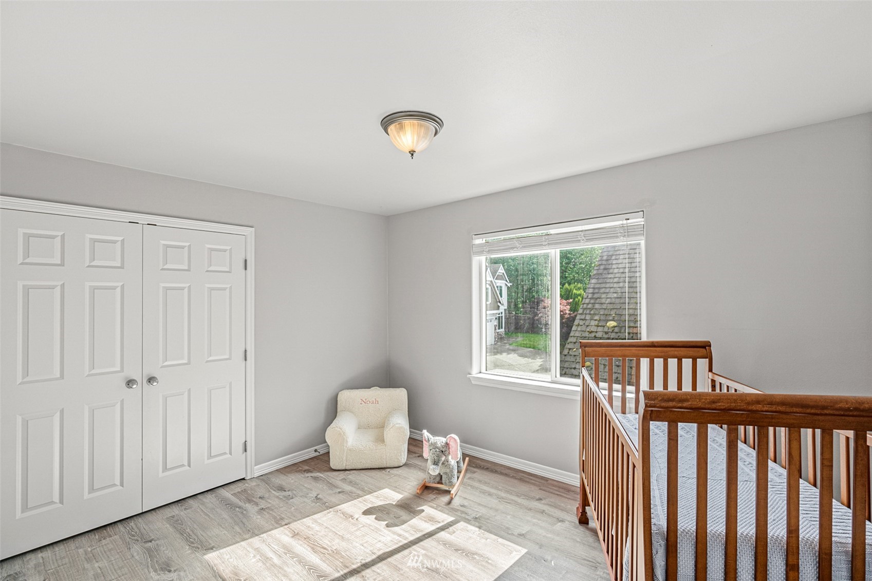 659 Orcas Avenue Northeast Renton, WA 98059 - Photo 27 of 40 a bedroom with furniture and a window