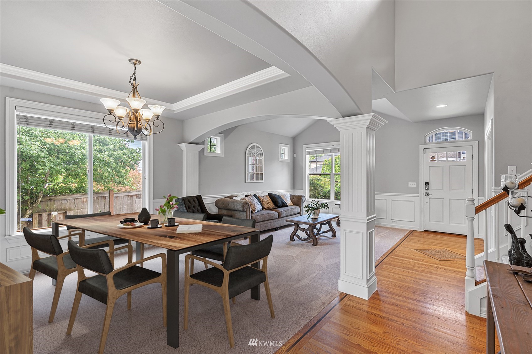659 Orcas Avenue Northeast Renton, WA 98059 - Photo 4 of 40 a view of a dining room with furniture window and wooden floor