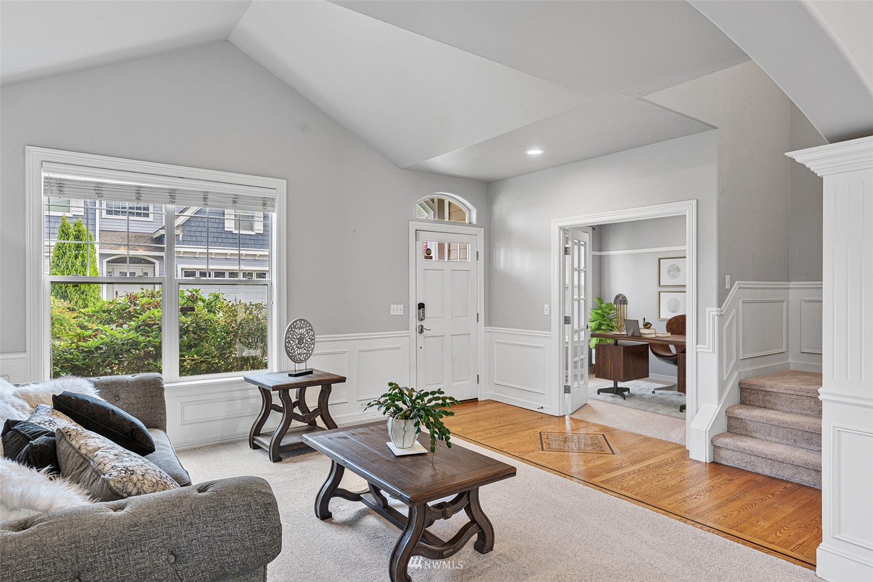 659 Orcas Avenue Northeast Renton, WA 98059 - Photo 7 of 40 a living room with furniture and a large window