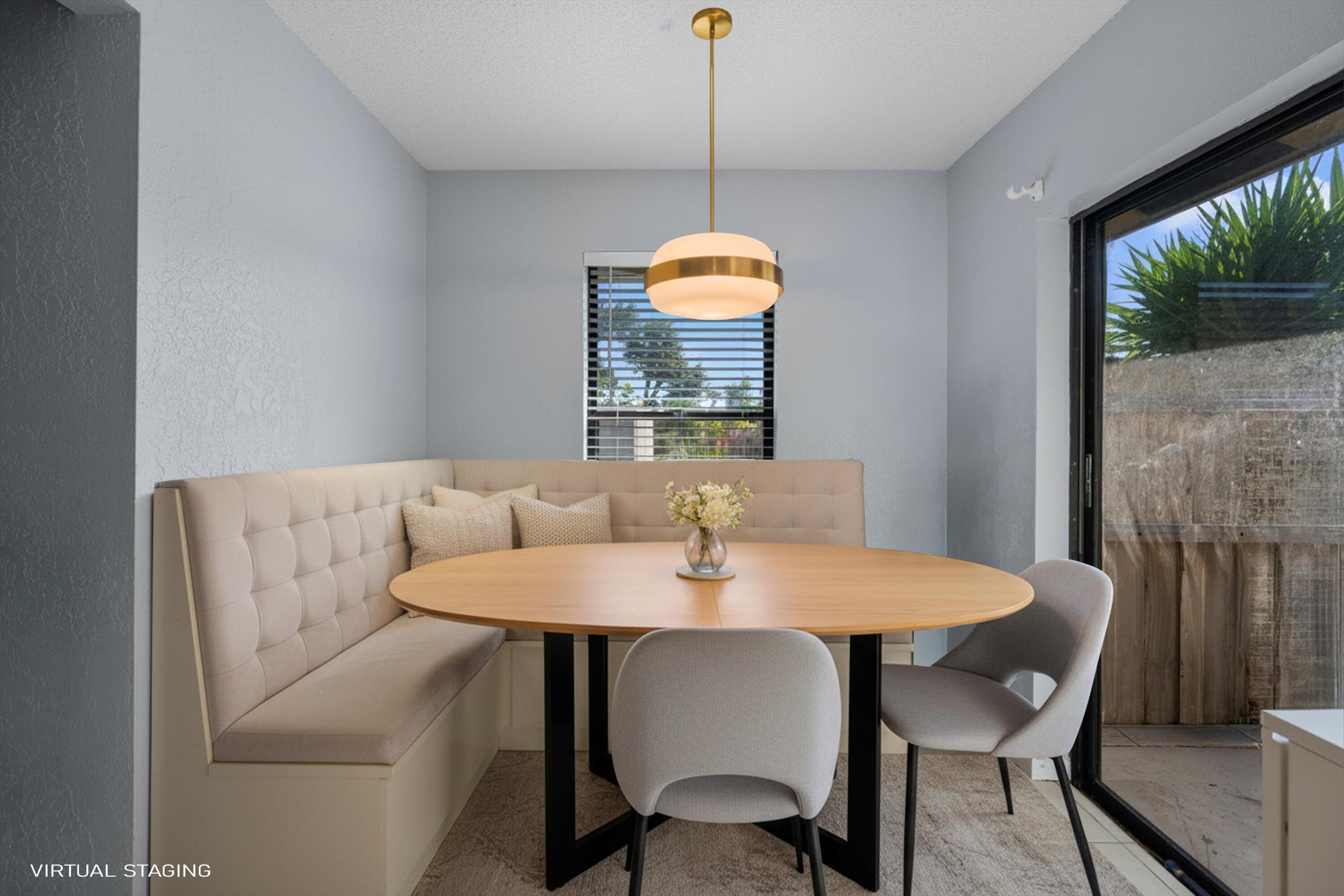 197 Southeast 1st Circle, Unit 15B Boynton Beach, FL 33435 - Photo 11 of 26 a view of a dining room with furniture window and outside view