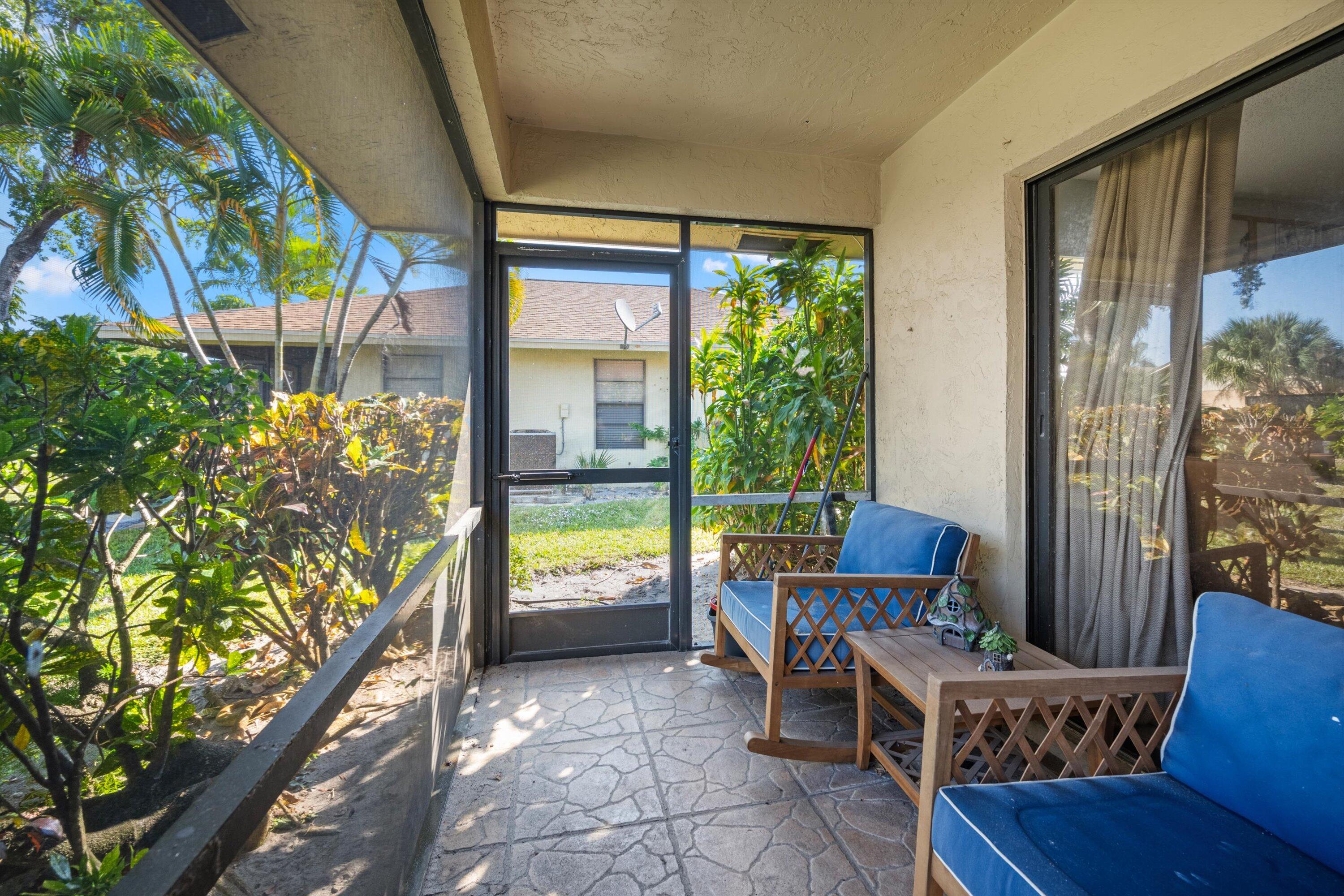 197 Southeast 1st Circle, Unit 15B Boynton Beach, FL 33435 - Photo 20 of 26 a outdoor space with chairs