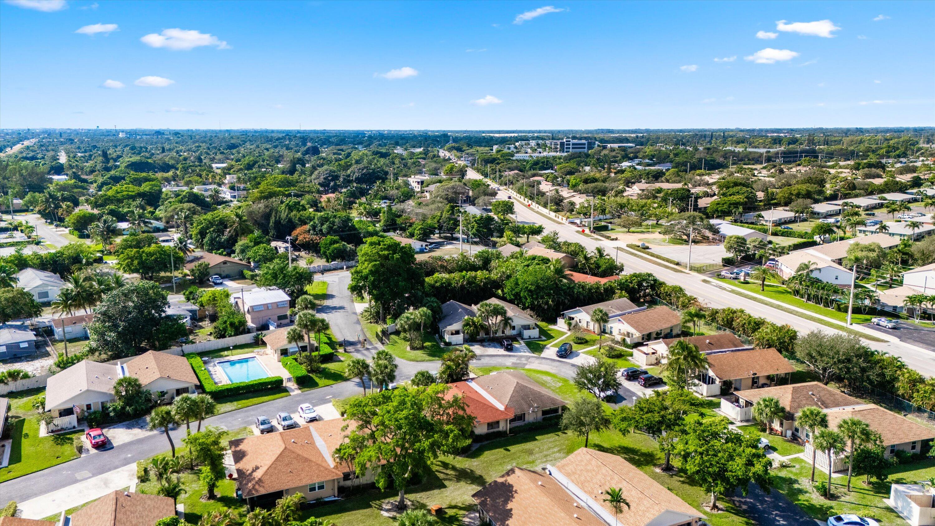 197 Southeast 1st Circle, Unit 15B Boynton Beach, FL 33435 - Photo 24 of 26 an aerial view of a city