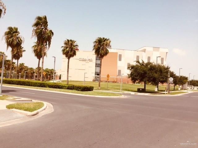 700 South Ware Road McAllen, TX 78501 - Photo 4 of 27 a view of a swimming pool and a yard