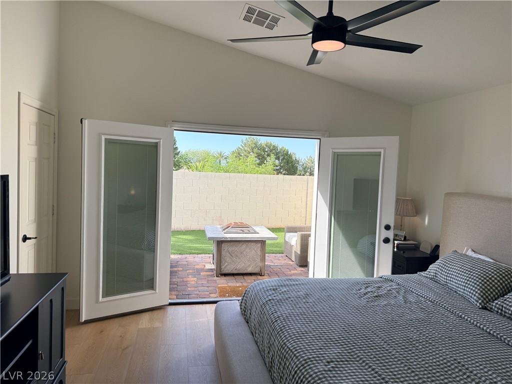 2122 Hidden Ranch Terrace Henderson, NV 89052 - Photo 4 of 4 French doors lead to a serene outdoor space, perfect for tranquil evenings.