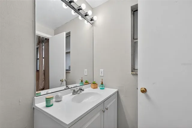 a view of an empty room with a large window