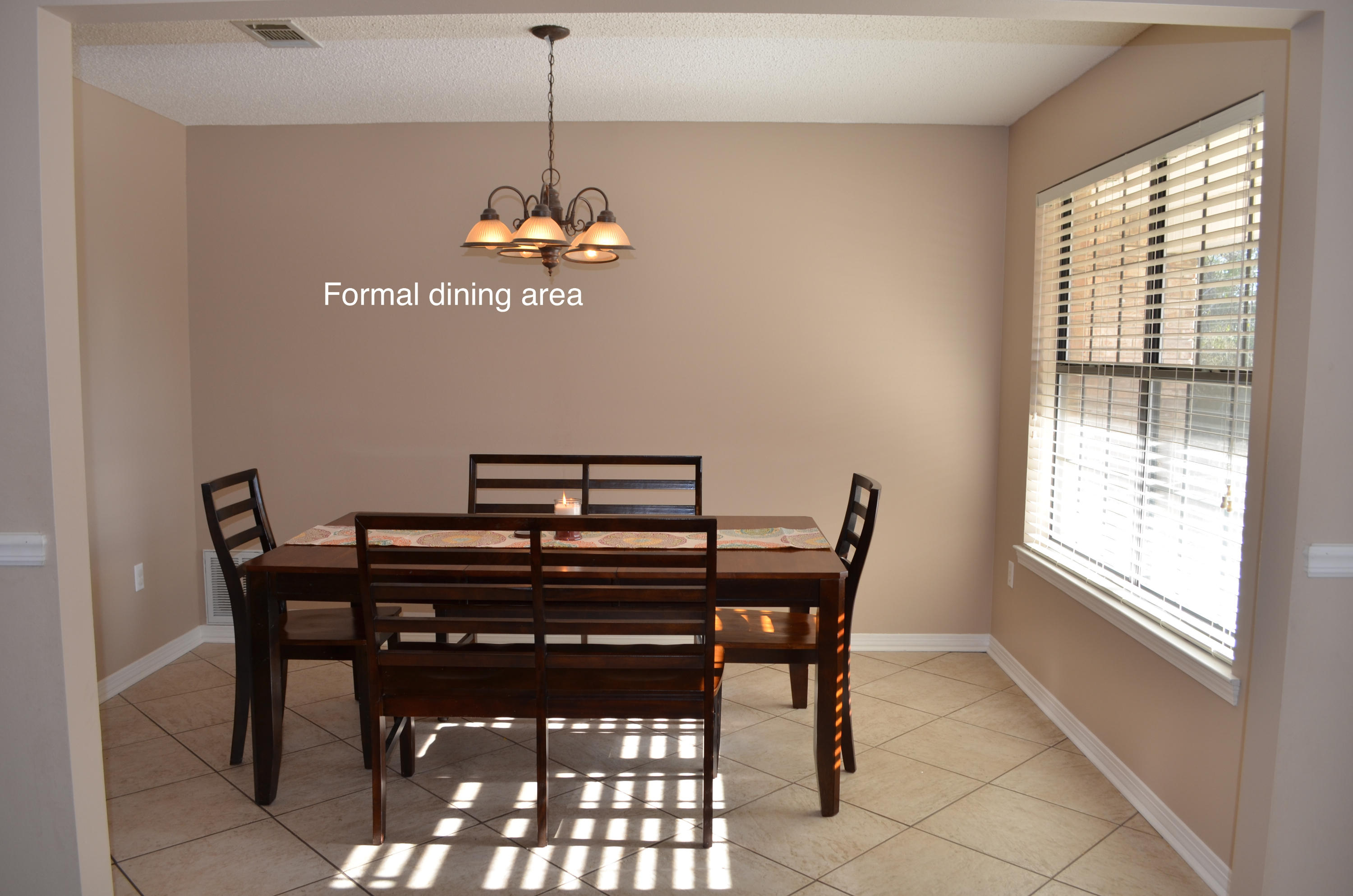 1977 Faulk Ferry Road Baker, FL 32531 - Photo 14 of 41 a view of a dining room with furniture window and outside view
