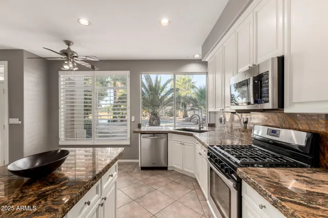 a view of an empty room with a fireplace