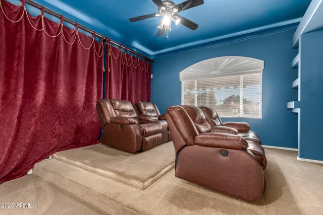 a view of a hallway with wooden floor and entryway