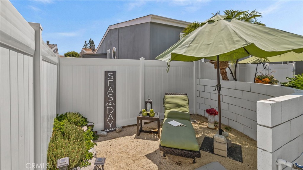 23301 Ridge Rte Drive, Unit 95 Laguna Hills, CA 92653 - Photo 22 of 35 a view of outdoor dining space in the backyard