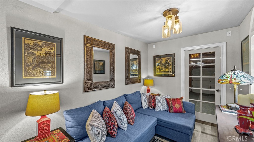 23301 Ridge Rte Drive, Unit 95 Laguna Hills, CA 92653 - Photo 24 of 35 a living room with furniture and a window