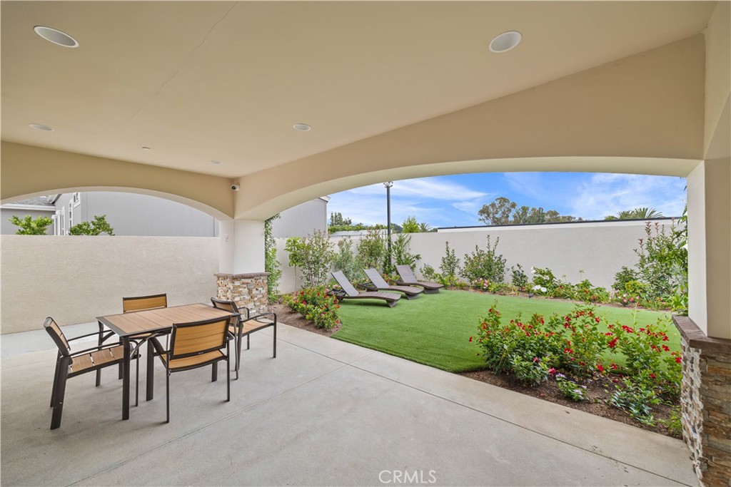 23301 Ridge Rte Drive, Unit 95 Laguna Hills, CA 92653 - Photo 31 of 35 a view of an outdoor dining space with seating area