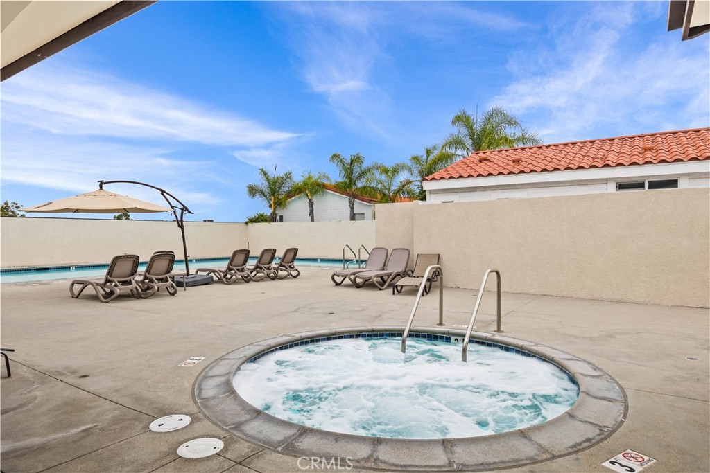 23301 Ridge Rte Drive, Unit 95 Laguna Hills, CA 92653 - Photo 33 of 35 view of a room with gym equipment