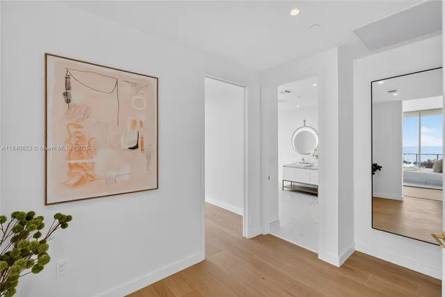 a roof deck with outdoor seating and city view