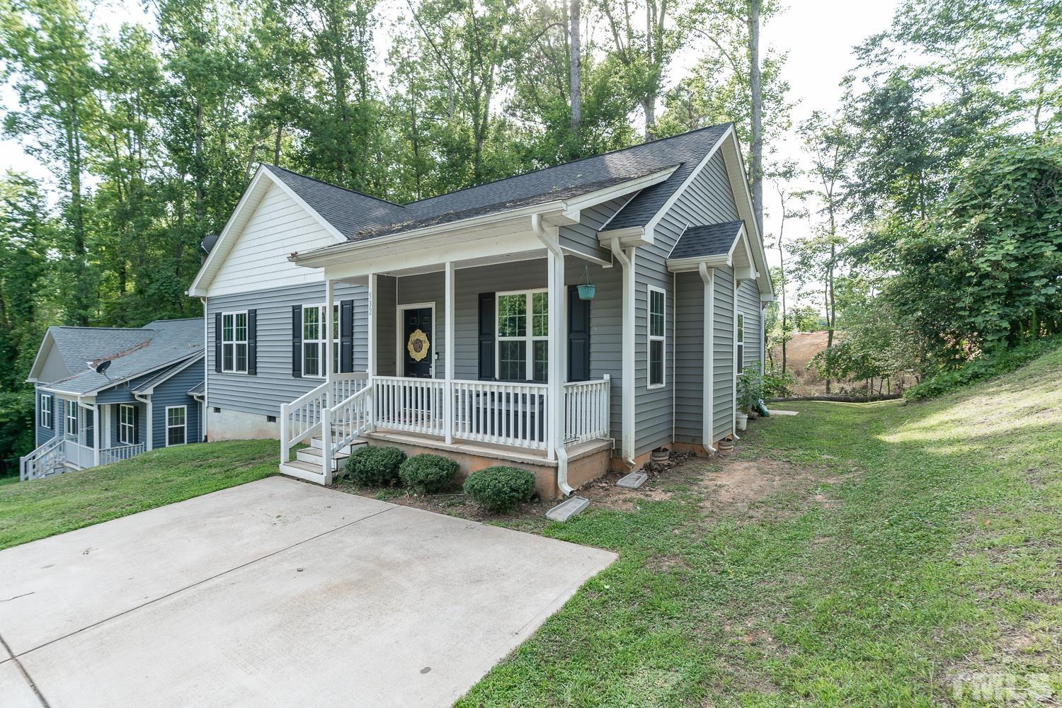 532 Cooper Street Clayton, NC 27520 - Photo 2 of 33 a view of outdoor space yard and front view of a house