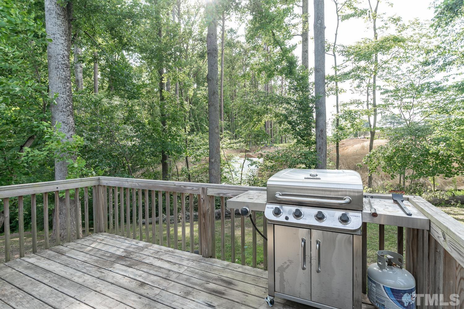 532 Cooper Street Clayton, NC 27520 - Photo 29 of 33 a view of balcony with wooden floor and outdoor seating