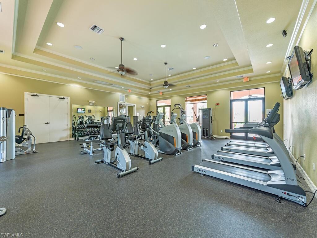 7777 Bristol Circle Naples, FL 34120 - Photo 17 of 22 a view of a room with gym equipment