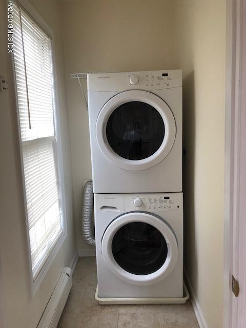 131 Mason Street, Unit 2 Greenwich, CT 06830 - Photo 14 of 14 a utility room with dryer and washer