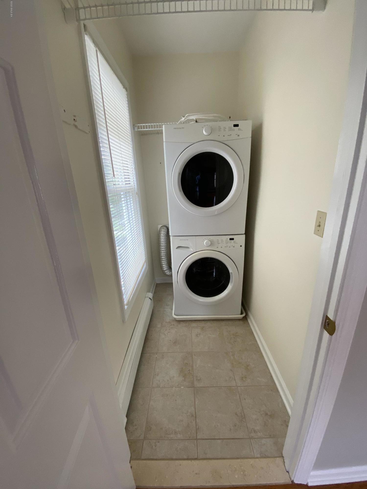 131 Mason Street, Unit 2 Greenwich, CT 06830 - Photo 10 of 14 a utility room with dryer and washer