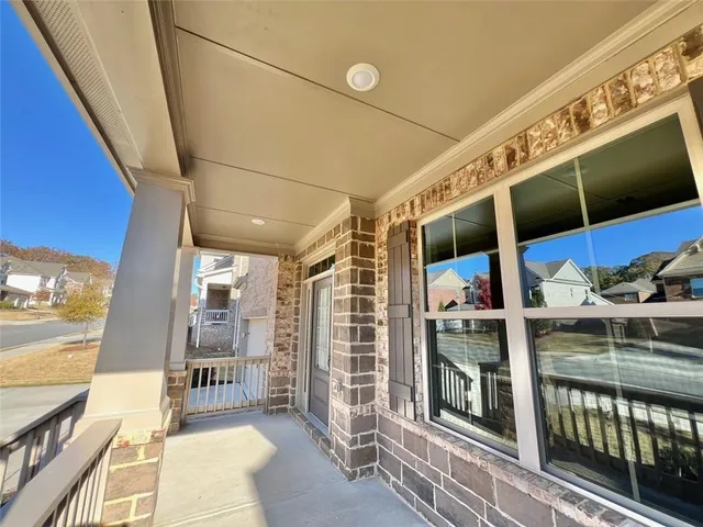 a view of a living room with a large window